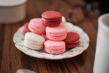 macaroons on a table with coffee in home