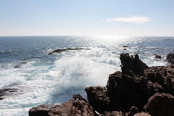 view of sea waves bursting on the rocks in Algarrobo beach in Chile