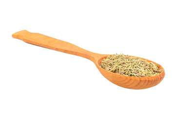 Dry rosemary in a spoon