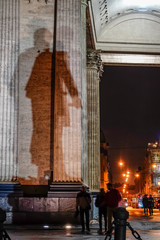 St Petersburg, Russia A statue at the Kazan Cathedral is shadowed on the facade.