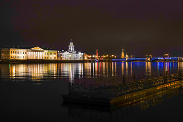 St Petersburg, Russia The Sankt-Peterburgskiy Nauchnyy Tsentr Ran, the University embankment and the Palace bridge at night.