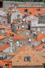Fototapeta na wymiar Red rooftops of town Dubrovnik on June 18, 2019.
