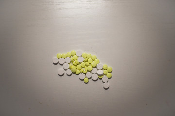 Colorful pills on the table