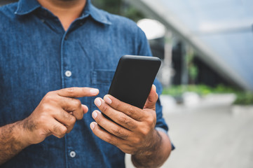 Close up hand using smartphone