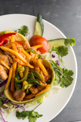 Mango chicken with green and red peppers