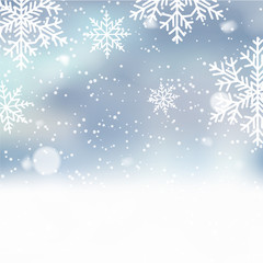Fototapeta na wymiar Christmas background with falling snowflakes on blue. Vector