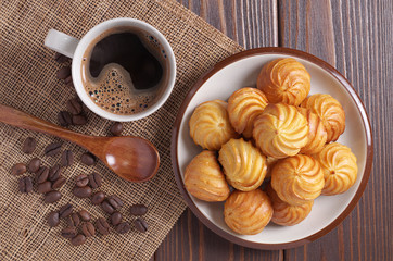 Small custard cakes and coffee