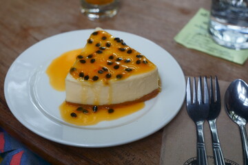 Cheese cake with passion fruit sauce