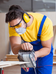 Carpenter working in the workshop