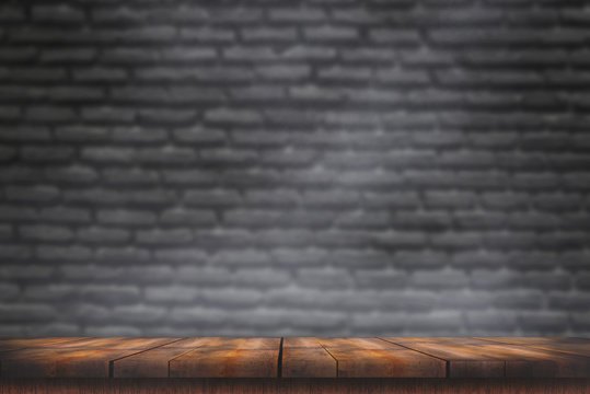empty wooden table with smoke float up on dark background