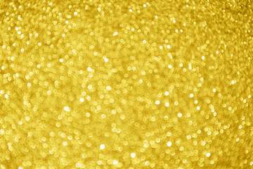 Abstract gold glitter sparkle bokeh light background