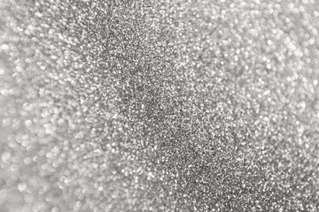 Abstract blur silver glitter sparkle defocused bokeh light background
