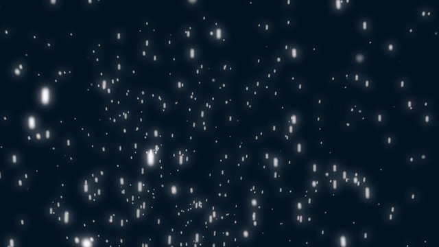 White nowflakes floating in the air on a black background.Ideal for making video effects