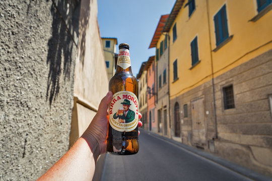 Moretti beer in hand in Montopoli in Val d'Arno, Italy.
