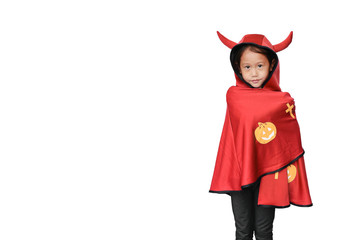 Peaceful little Asian child girl dressed Halloween costume. Kid in Dracula robe isolated on white background with copy space.