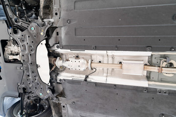 car undercarriage in garage station workshop during inspection chassis