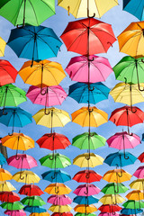 Street decorated with colourful umbrellas
