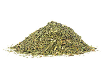 Pile of dried chopped tarragon on a white background. Estragon. Artemisia dracunculus.