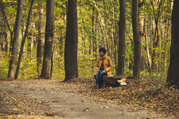 Fototapeta premium Hipster girl in a park