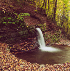 Autumn mountain waterfall