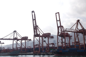 Fototapeta na wymiar Container cargo ship and Gantry Cranes