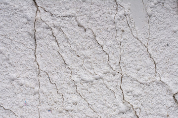 Cracks in the wall closeup.