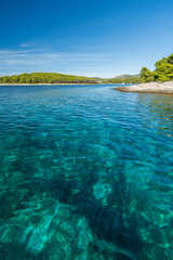 Clear blue turquoise water in the mediterranean sea in croatia. Island near hvar Paklinski Otoci 