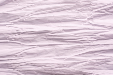 Obraz premium Crumpled sheet of white paper close-up.