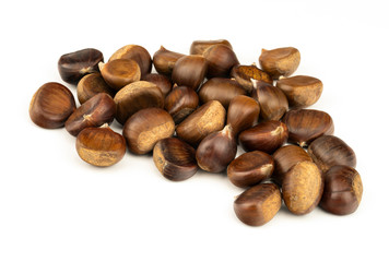 Chestnuts with shell isolated on white background, a pile of fresh chestnuts