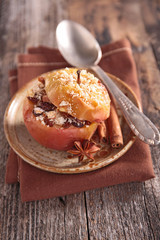 baked apple with syrup and nuts