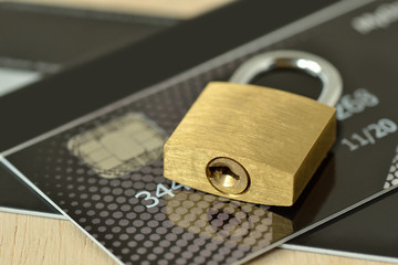 Naklejka premium Padlock on credit card - Concept of security and protected paying
