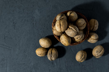 healthy walnuts on a dark background