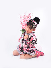 asian little girl and boy playing  Wearing yukata on white backgound