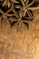 star anise isolated on wooden background