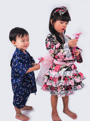 asian little girl and baby boy  Wearing yukata with fruit cart on white backgound