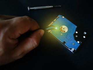 The concept of computer hardware upgrade and technology. Repairing and upgrade SSD (Solid State...