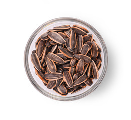 Healthy sun-flower seeds on a white background