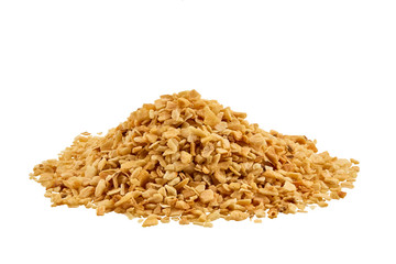 Chopped garlic isolated on white background with copy space for text or images. Spices and herbs. Packaging concept. Close-up.