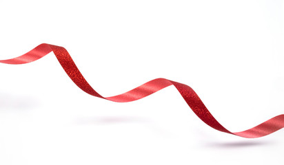 Red ribbon isolated on white background.