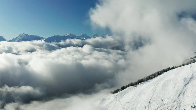 Misty winter sunrise in the Swiss Alps mountains. Aletsch arena, Switzerland.