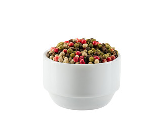 Mixture of peppercorns in a bowl isolated on white background with copy space for text or images. Spices and herbs. Packaging concept. Close-up.