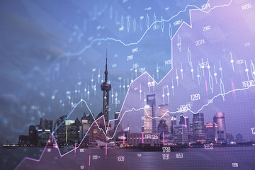 Forex chart on cityscape with tall buildings background multi exposure. Financial research concept.