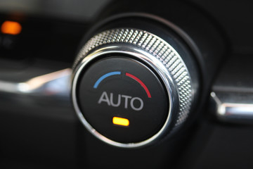 AUTO ventilation knob in luxury vehicle