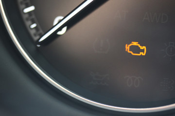 Check engine light in vehicle tachometer