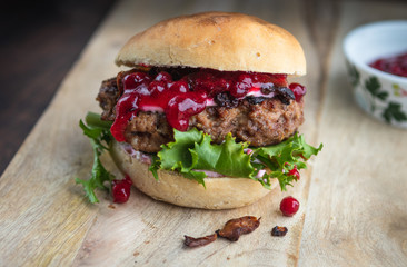 Homemade moose burger with lingonberry jam