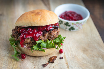Home made moose burger with lingonberry jam.