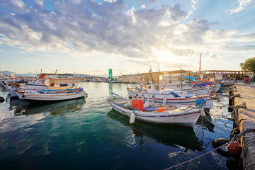 Naklejka na ściany i meble Harbor with leisure and fishing boats at anchor, Perdika, Egina Island, Greece.