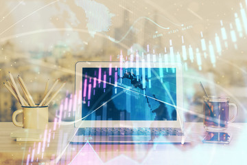 Forex Chart hologram on table with computer background. Multi exposure. Concept of financial...