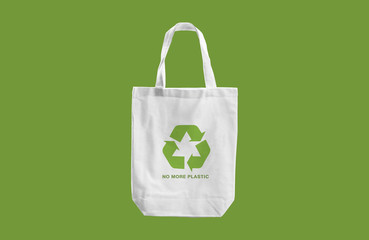 white cloth bag with Recycle sign logo and words 