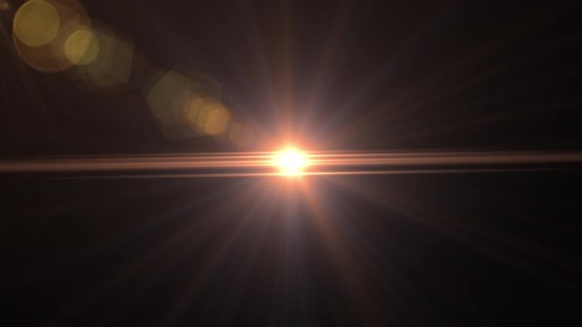 Sunlight with flare on black.Sun rise motion design.Digital lens flare background.
